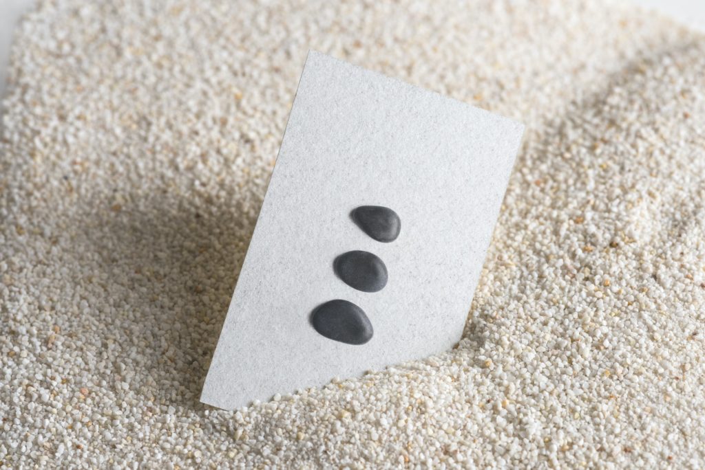 Minimal business card with zen stones in wellness concept